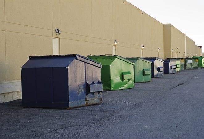 a stack of yellow construction dumpsters on a job site in Arlington WA